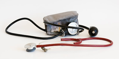 a standard blood pressure cuff and stethoscope