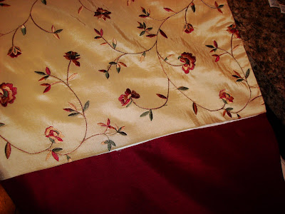 floral and red drapes with hemming tape