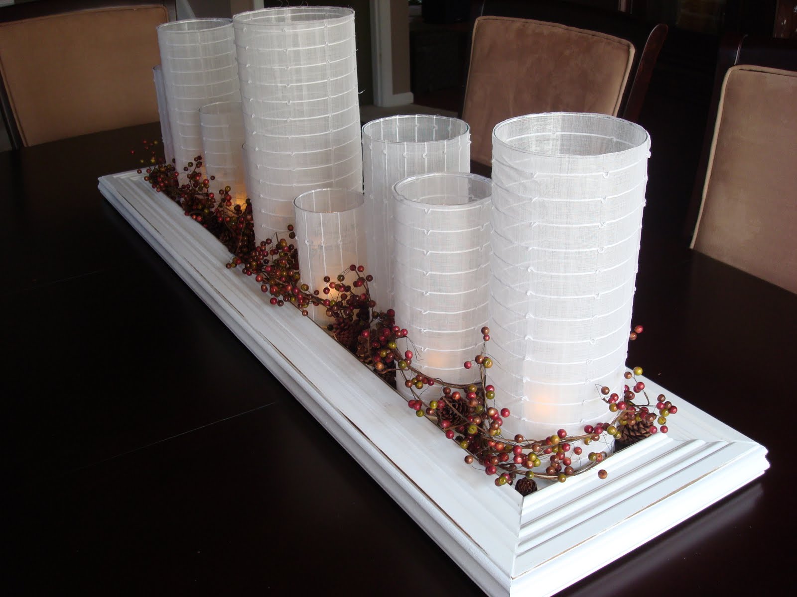 white fabric around glass candle holders