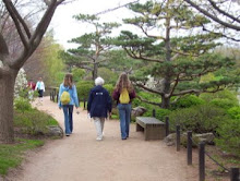Grandma and girls walking at the gardens