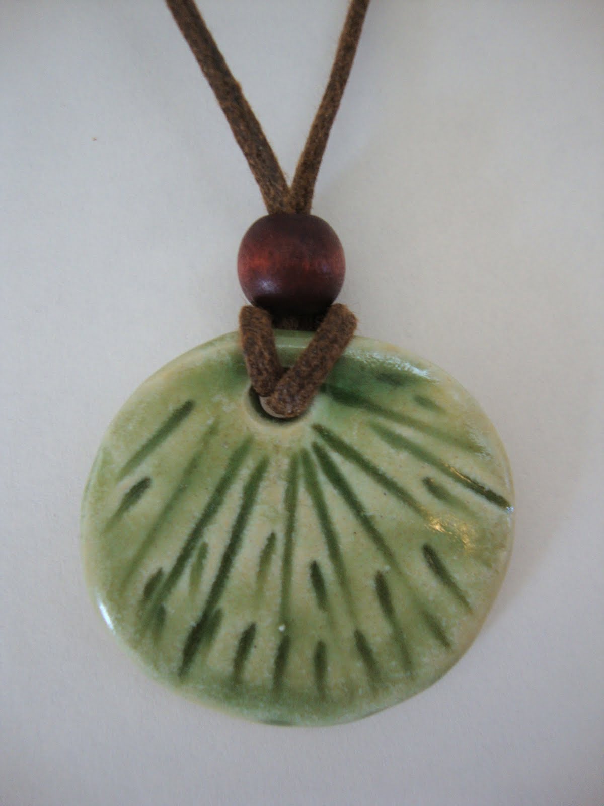 Pottery on Prince Edward Island Pottery Pendants by Suzanne Scott