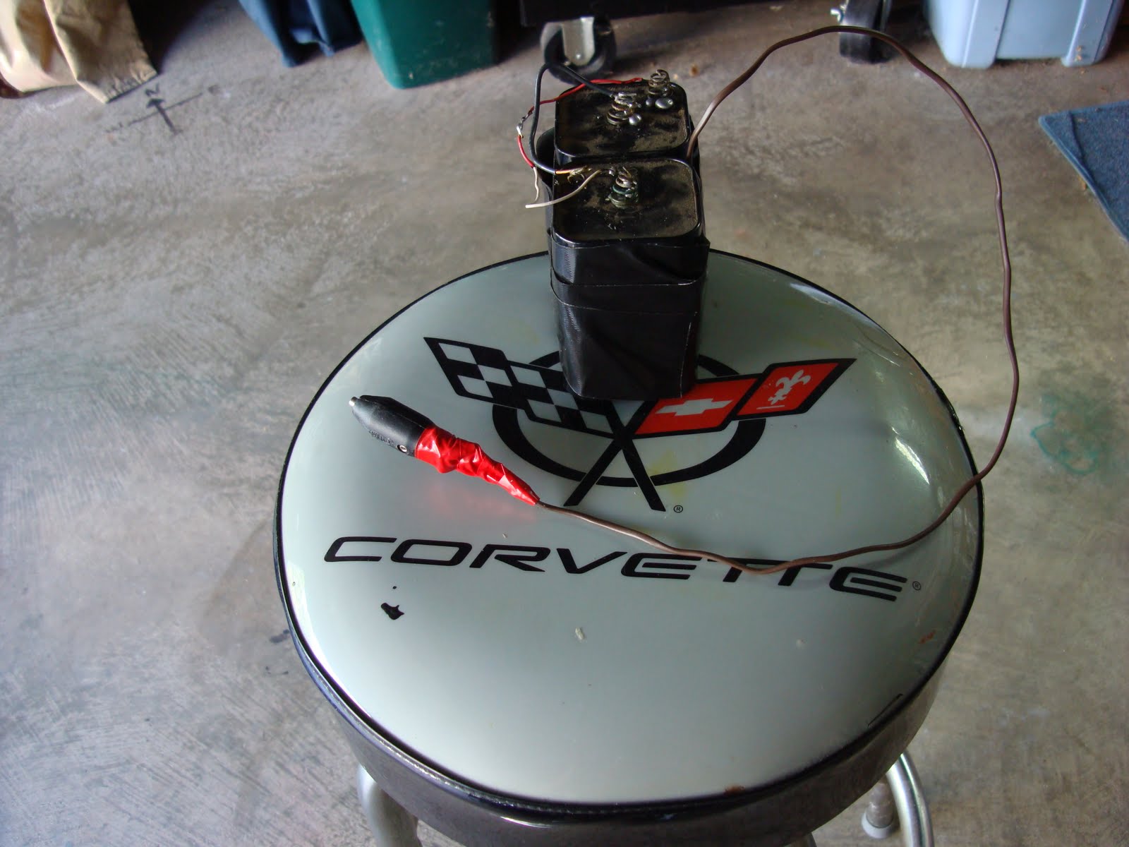 Photons and Electrons Changing a Battery in a C5 Corvette and Charge