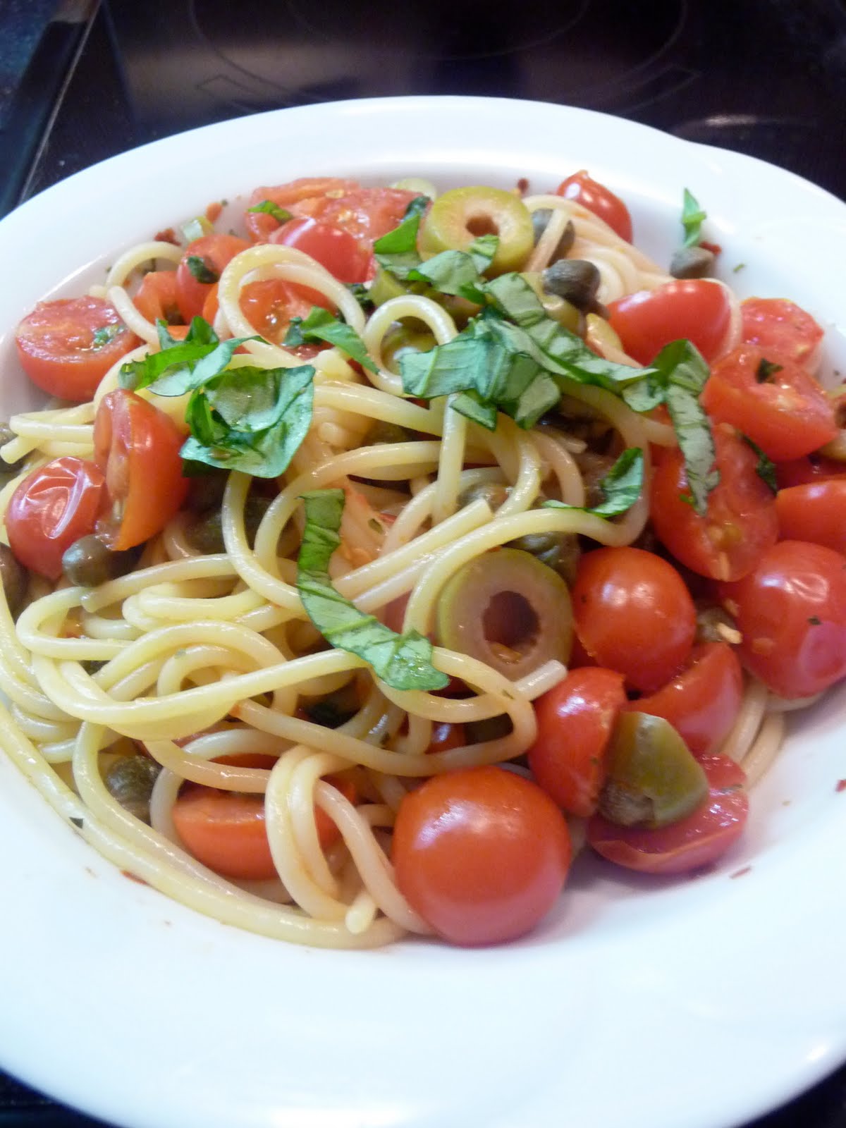 The Wandering Cook Spaghetti with cherry tomatoes, capers and olives