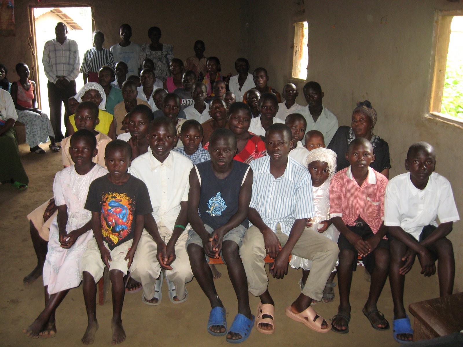 [Orphans+assembled+@+nearby+village.jpg]