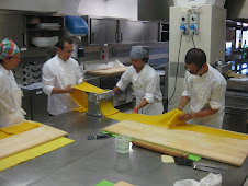 Rolling out a 20 foot sheet of Pasta