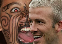 Spewked photograph of David Beckham with bare-chested New Zealand warrior