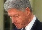 Bill Clinton hangs head in contemplation of answer