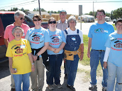 Covenant Staff and mission committee working together on a Habitat House