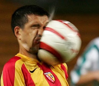 funny football photos ball hits face
