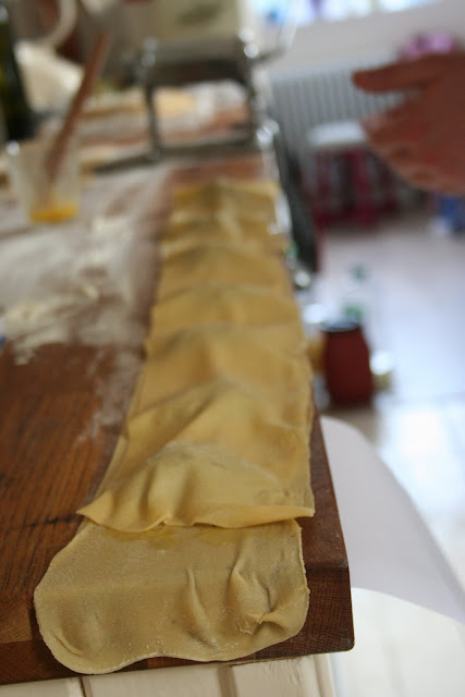 ravioli, sealing the parcels with egg