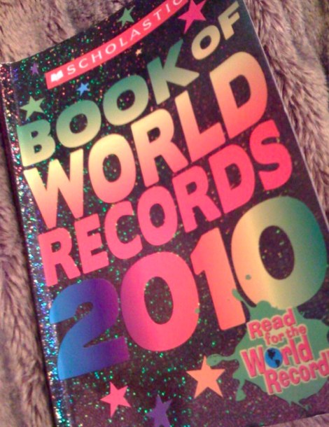 Reading Saves the Day!: Scholastic Book of World Records 2010