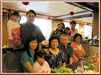 Snapshot of our beloved family, plus my sis, inside Benteng Coffee House, Quality Hotel