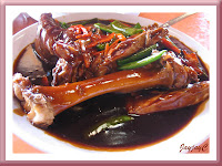 A plate of braised pork in thick soya sauce