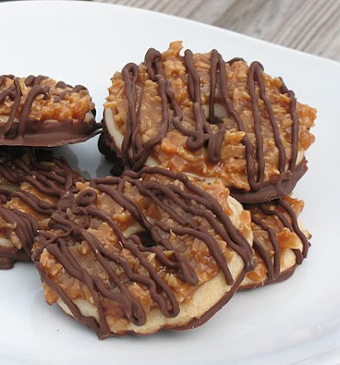 A close up photo of girl scout copycat somoas cookies on a white plate.