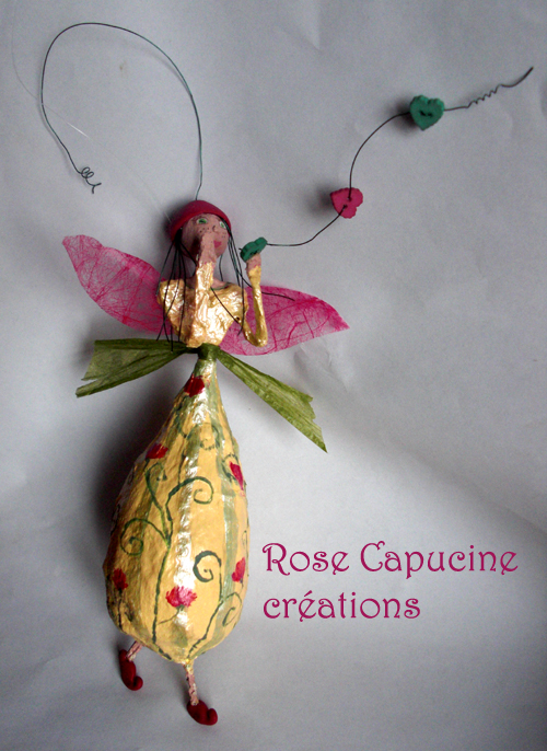 Rose Capucine Eliza personnage féérique et décoratif en Rose Capucine Eliza personnage féérique et décoratif en
