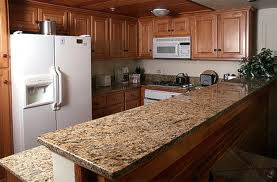 Kitchen Granite Countertops With glistening solid granite countertops and wonderful wood flooring
