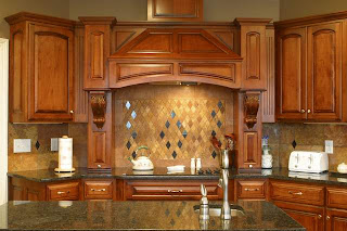 Kitchen Tile Backsplash Pictures Using lighting under your kitchen cabinets will make your tile look 