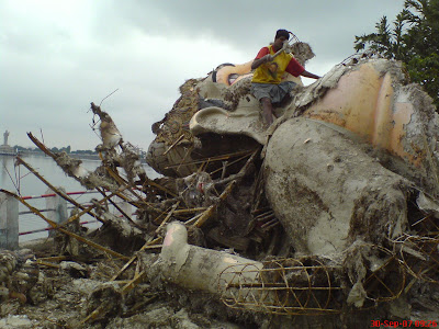 Ganesha idol being dismantled