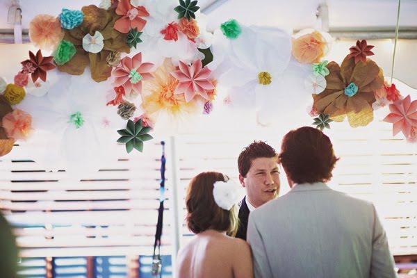 how fabulous is their paper flower arch and dudes they got married in a 