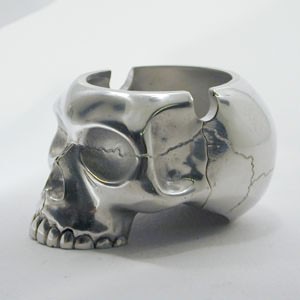 he skull head ashtray is available in solid sterling silver or gold.