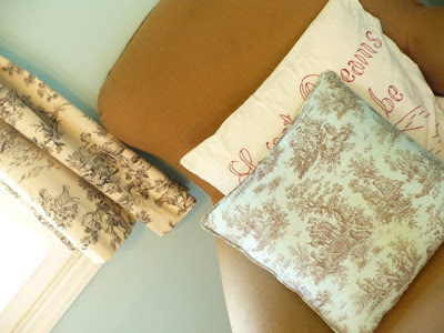 blue and brown toile pillow
